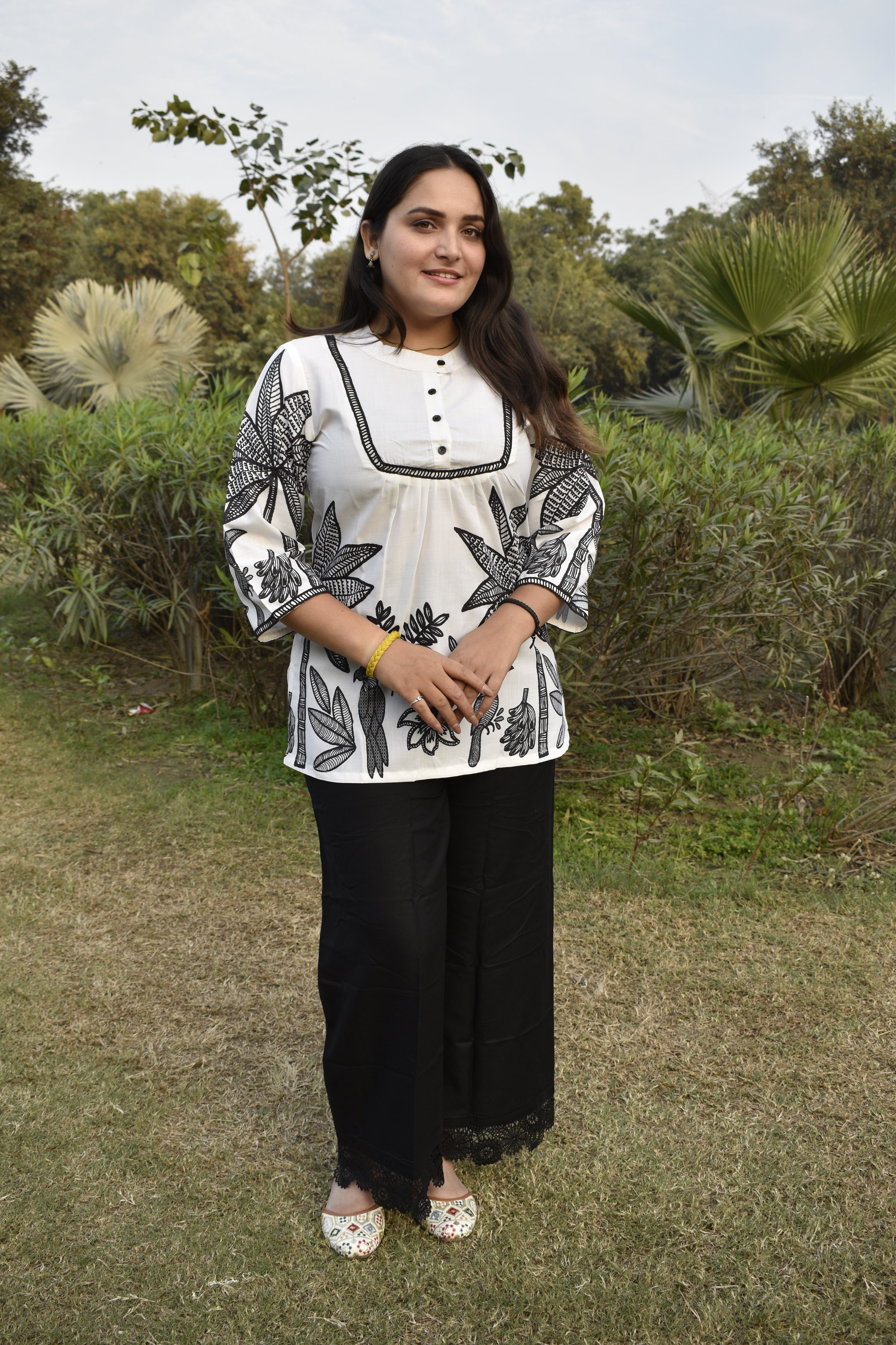 White Floral Printed Cotton Kurti with Black Lace Panel | Designer Everyday Wear | Elegant Monochrome Look for Office & Outings